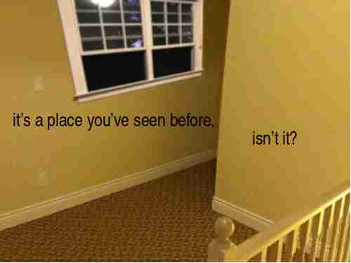 A photo of a corridor, looking slightly downward. The walls and carpet are both yellow or beige. There's window in the wall, open, but it's pitch black outside. Something doesn't feel right about the image. Text in black sans-serif reads, 'it's a place you've seen before, isn't it?'